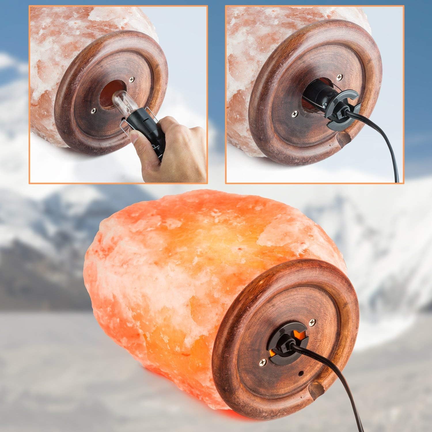 Himalayan salt lamp with wooden base and electrical cord, set against a mountainous background.