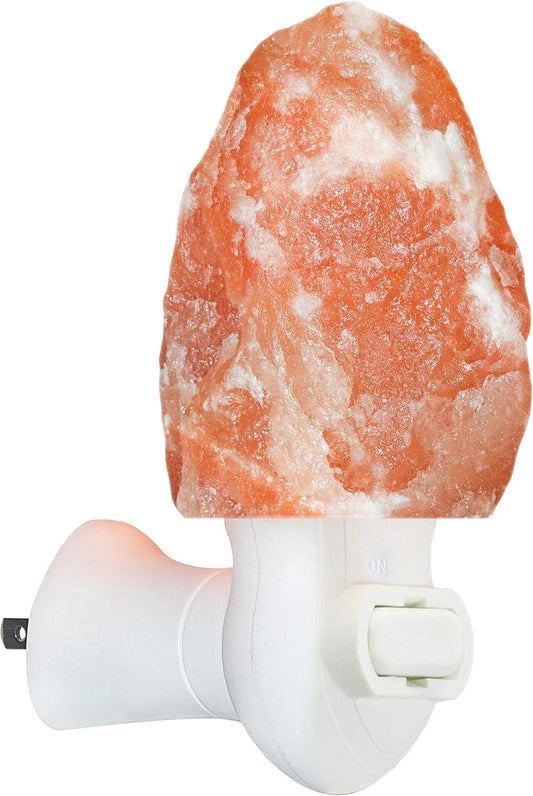 Himalayan salt lamp with a white base on a white background