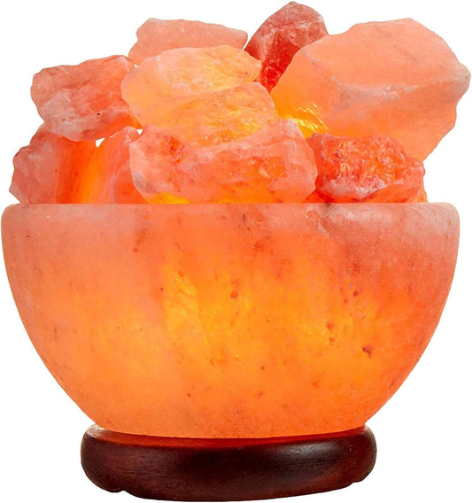 Himalayan salt lamp with natural salt crystals on a white background