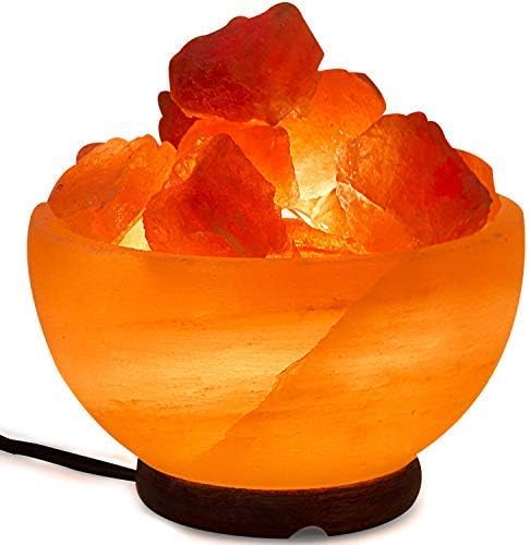 Himalayan salt lamp with clear crystals on a white background
