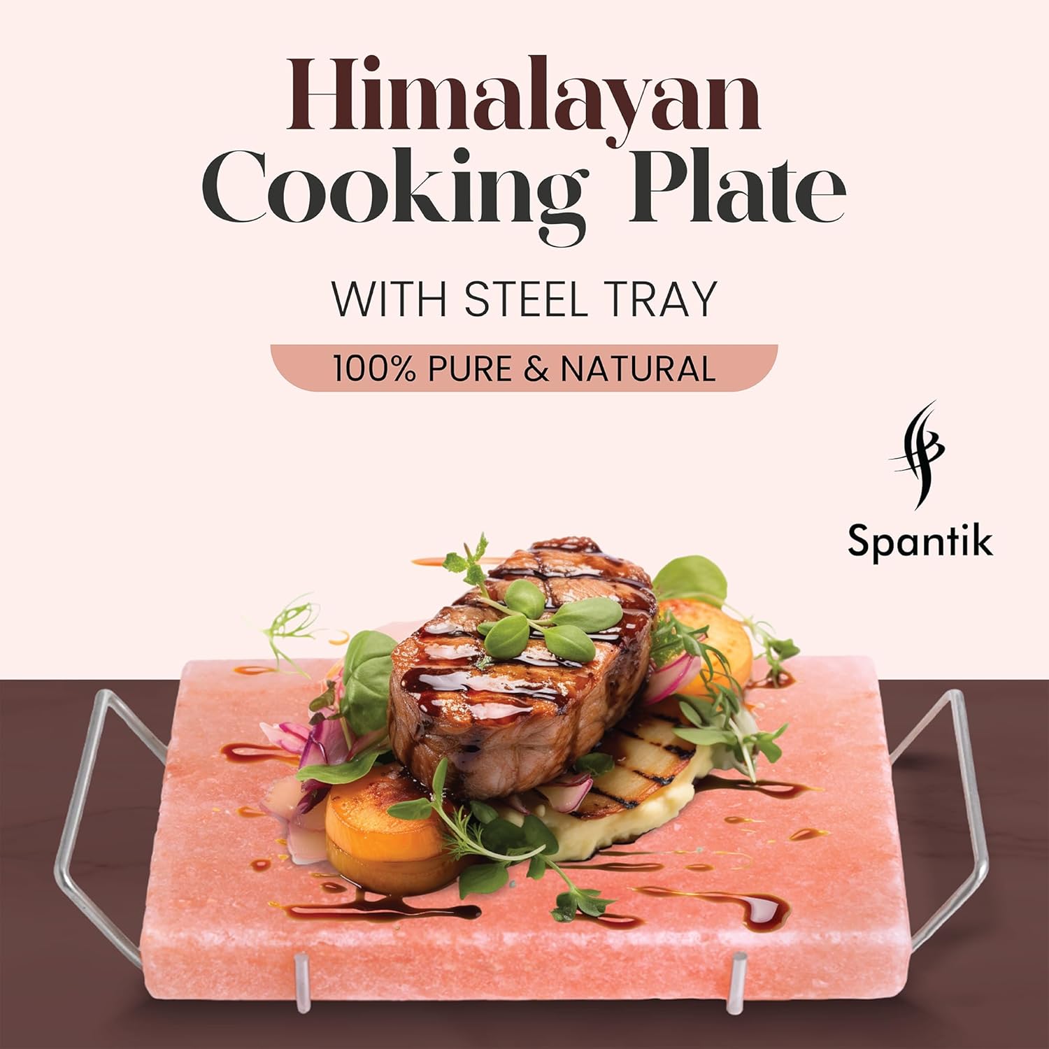 Himalayan cooking plate with steel tray displaying a dish of meat and vegetables, branded as Spantik.