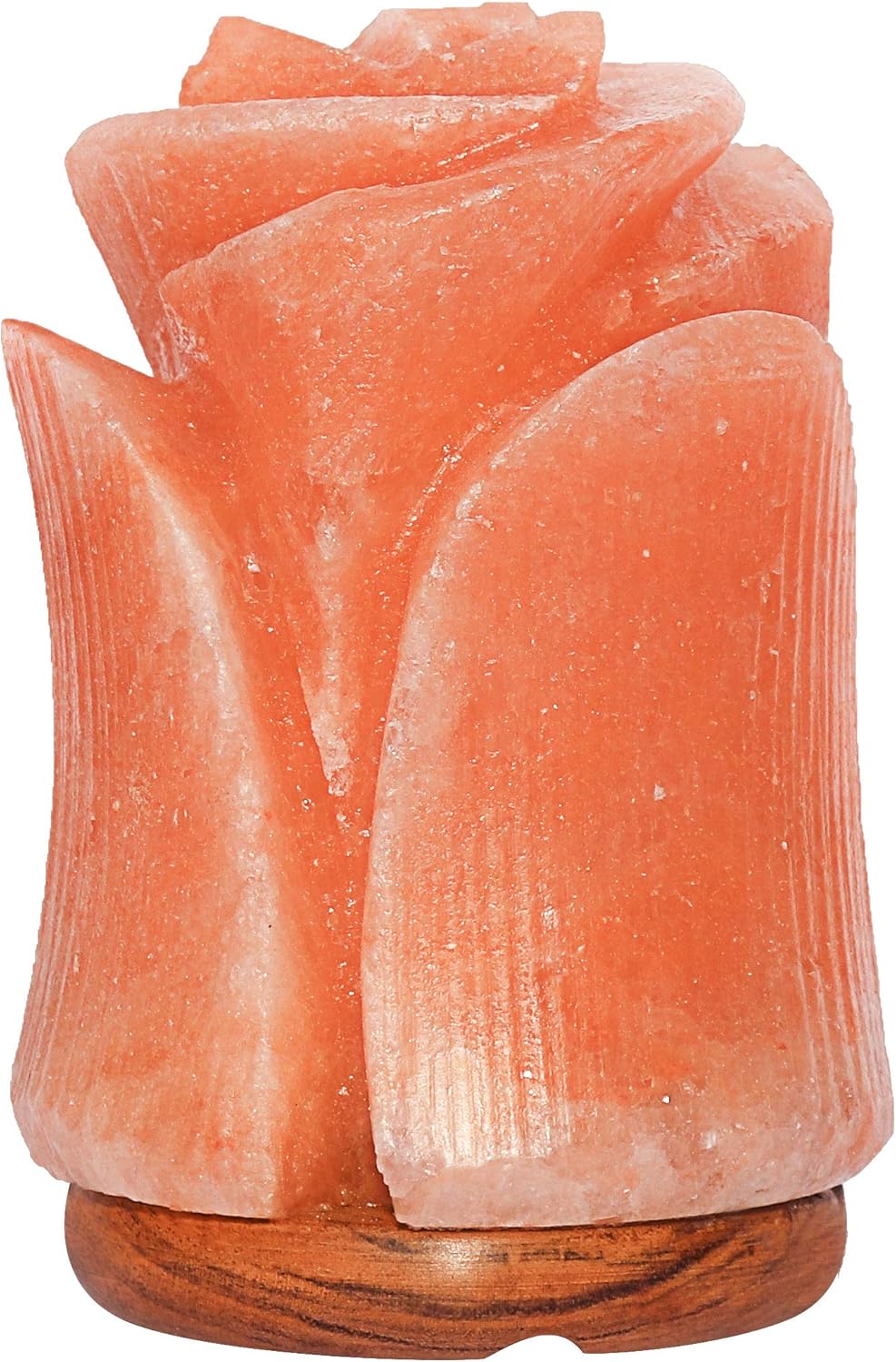 Rose-shaped pink salt lamp with wooden base on a white background